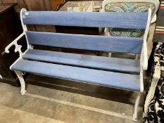 A Victorian style painted cast iron and wooden slatted garden bench, length 131cm, depth 54cm,