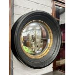 A contemporary parcel gilt convex wall mirror, diameter 50cm