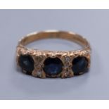 A 9ct gold sapphire and diamond half hoop ring, size O, gross 4 grams