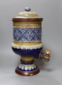 A Royal Doulton Lambeth stoneware water urn and cover, 41cm tall