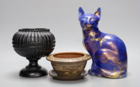 An opaque black glass vase, a Chinese bowl on stand and a Tony Laverick cat model, 22cm tall