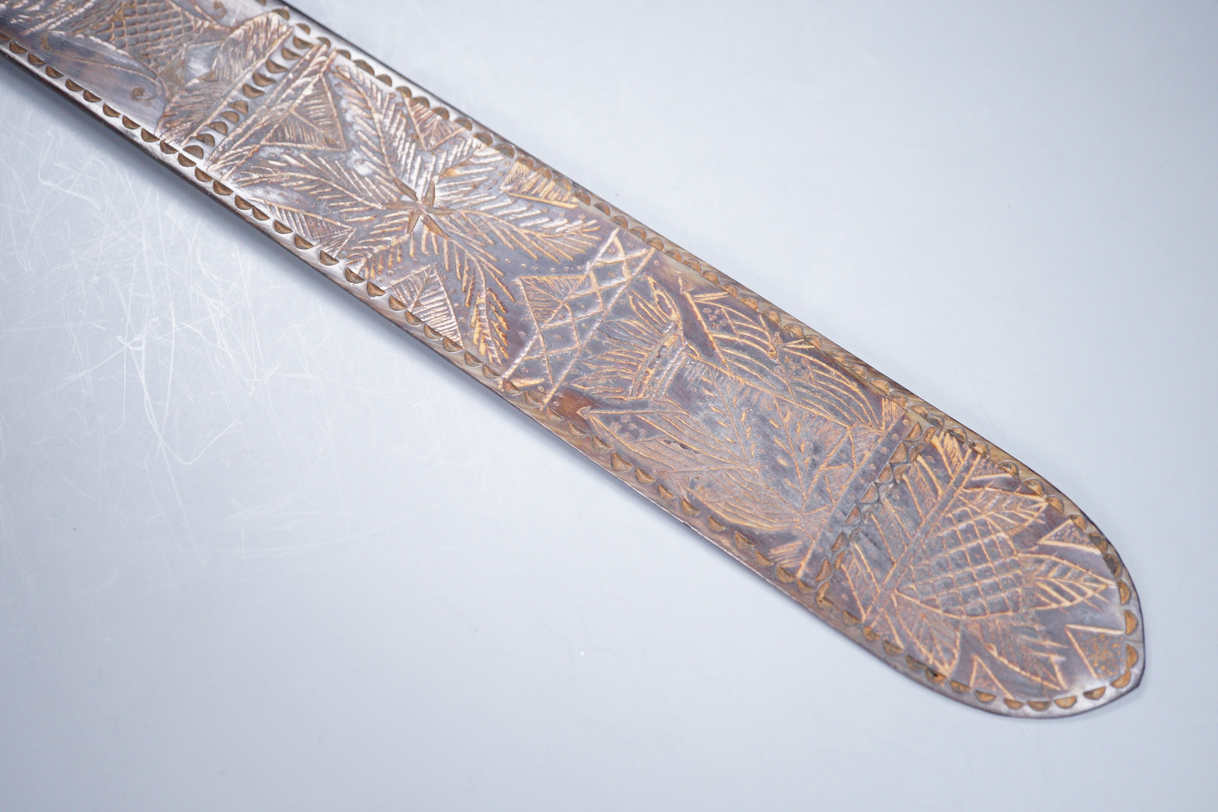 A 19th century carved horn page turner with bone inset roundels, 30.5cm - Image 6 of 6