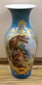 A large blue Sevres vase with sectioned botanical decor, 67cm tall