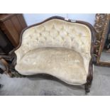A Victorian rosewood buttonback upholstered settee, length 120cm, depth 80cm, height 84cm