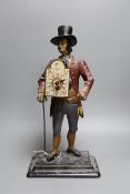 A late 19th century Dutch painted spelter figural timepiece, 40cm tall