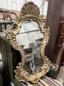 A 19th century Italian carved giltwood and gesso wall mirror, width 62cm, height 108cm