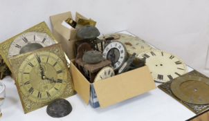 A large quantity of clock parts, to include movements, dials etc., including a John Marshall of
