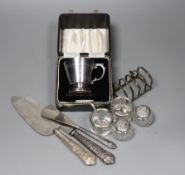 An Art Deco design silver christening can, Birmingham 1961, with fitted case, a toastrack and