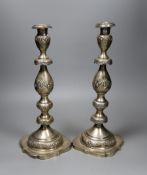 A pair of George V silver candlesticks, with floral swagged knopped stems, London 1924, 36cm, 30.5