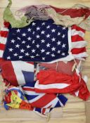A mixed collection of flags and bunting to include the Union Jack and the star spangled banner