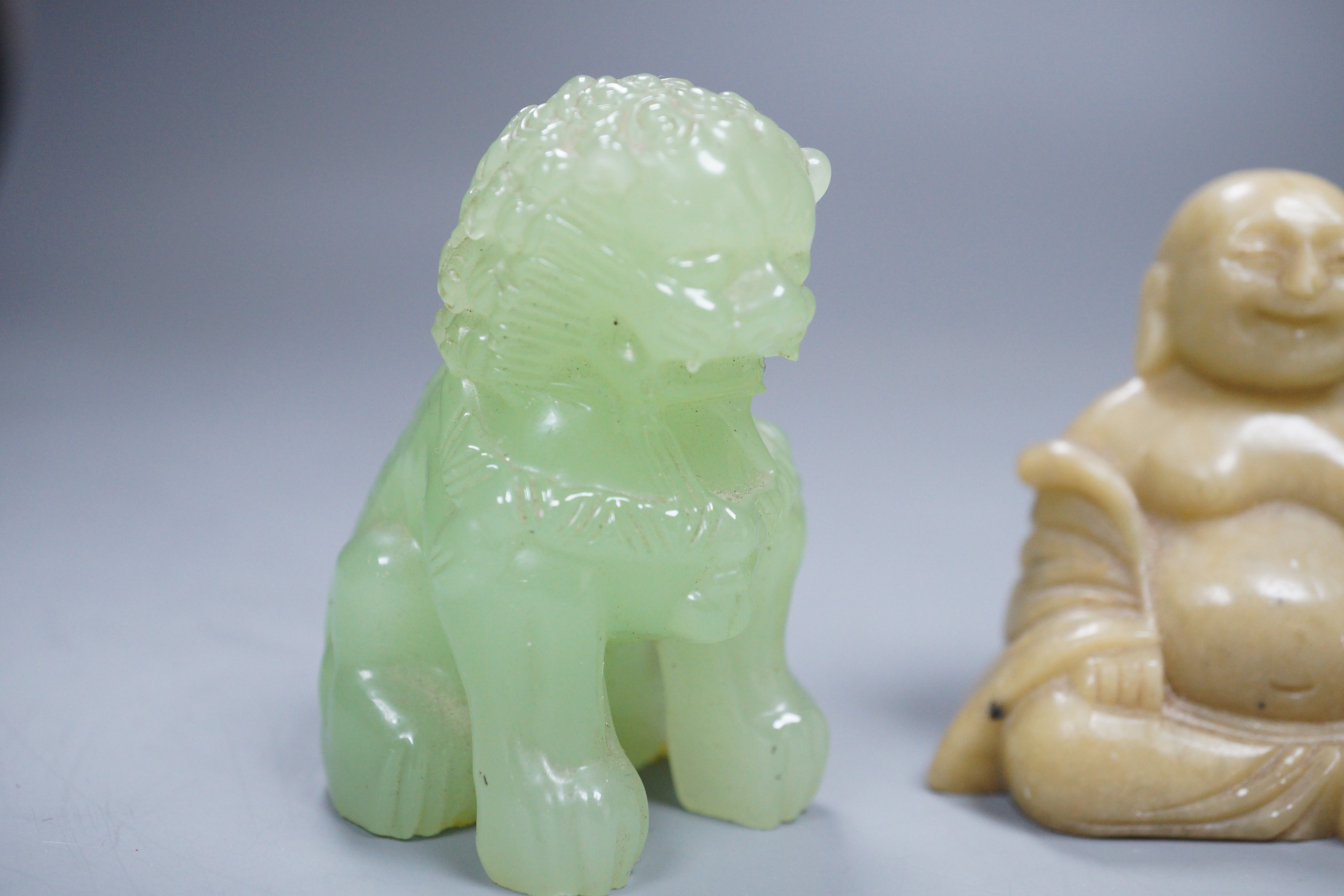 Two bowenite Buddhistic lions and a soapstone Buddha, 7cm - Image 2 of 4