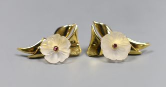 A pair of 18ct gold, rock crystal and cabochon ruby earrings of stylised floral design, 3cm, gross