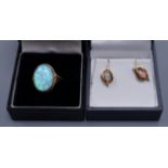 A 9ct gold white opal doublet ring, size O and a pair of white opal mounted ear studs