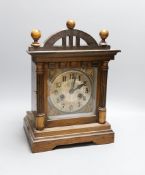 A German walnut mantel clock, 38cm