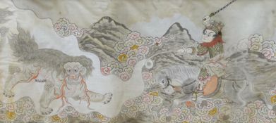 A framed Chinese silk study depicting a solider on horseback executing a dragon in stance, 49 x