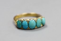An 18ct gold turquoise set five stone half hoop ring with diamond chip intersections, size R,