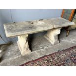 A rectangular reconstituted stone garden bench, length 126cm, depth 40cm, height 44cm