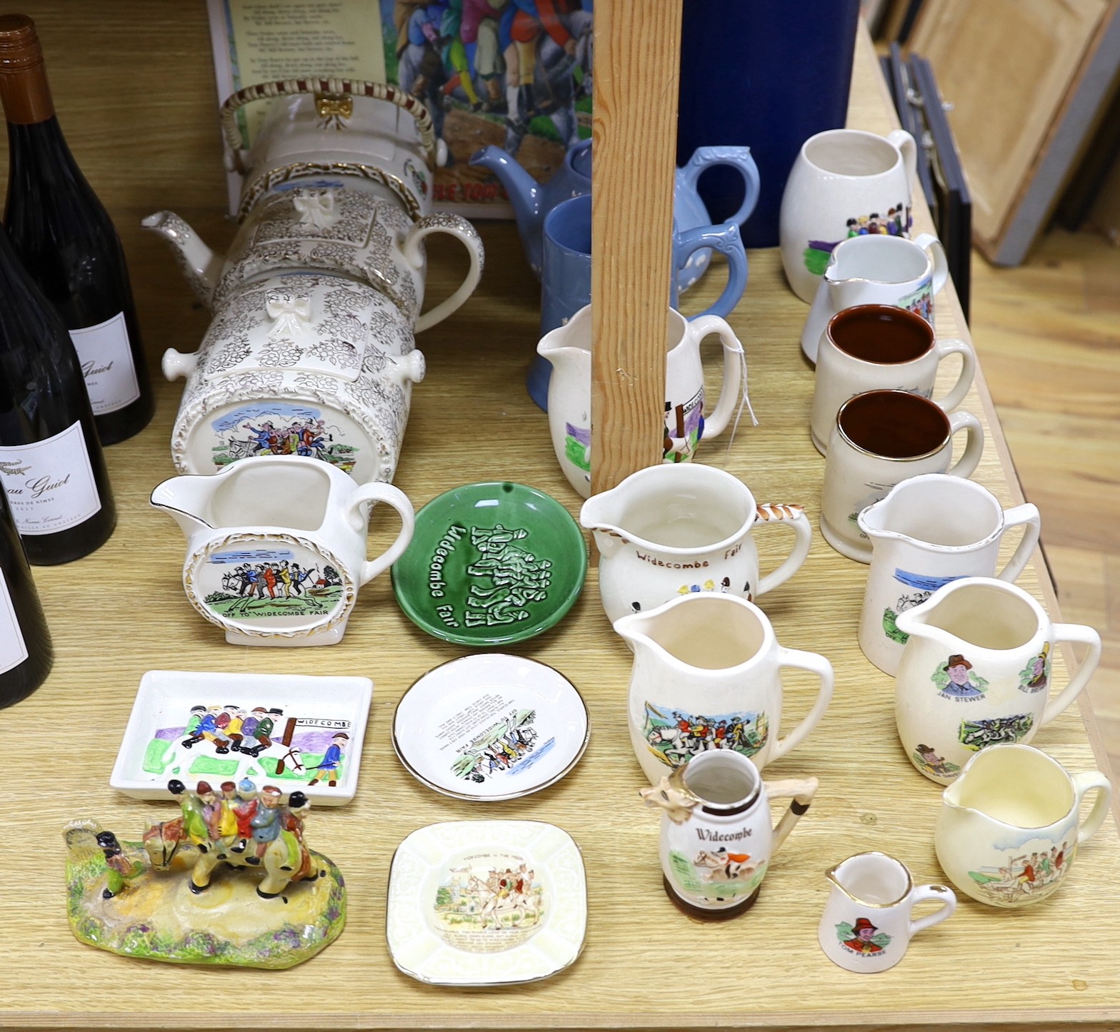 A quantity of novelty items relating to Widecombe Fair, to include jugs, teapots etc.