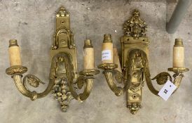 A pair of brass twin branch ormolu wall lights, height 42cm