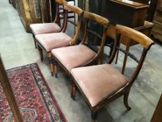 A set of four Regency rosewood dining chairs