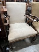 A Georgian mahogany scroll arm elbow chair on cabriole legs and pad feet, width 72cm, depth 60cm,