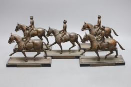 Five bronze spelter models of dressage horse and rider awarded to Domini Lawrence c.1970s, 15cm