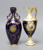 A Coalport blue ground ewer, with a gilded oval panel with a loch scene, c.1900, and a Royal Crown