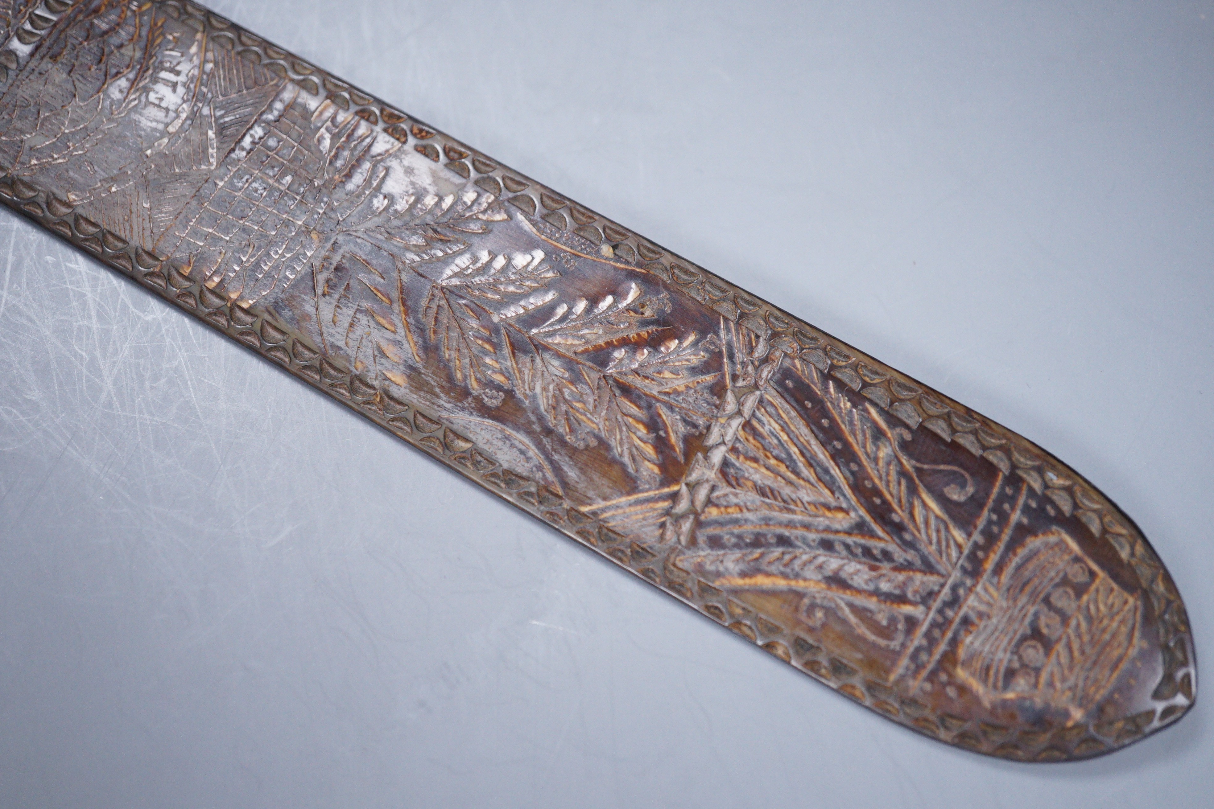 A 19th century carved horn page turner with bone inset roundels, 30.5cm - Image 4 of 6