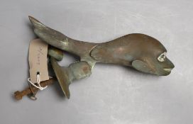 A Victorian cast bronze Dolphin door knocker,21cms long.