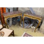 A pair of late 19th century French carved giltwood marble top console tables, width 80cm, depth