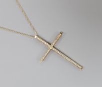 A modern 9ct gold and diamond cluster set cross pendant, 49mm, on a 9k fine link chain, 40cm,