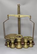 A set of grocer's scales by W&T. Avery Ltd., Birmingham with an 7 LB, two 4 LB, 2 LB and a 1 LB