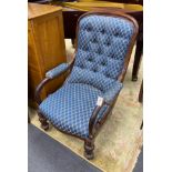 A mid Victorian rosewood upholstered buttonback open armchair, width 65cm, depth 70cm, height 105cm