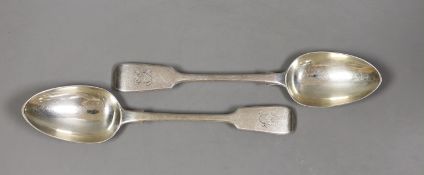 A pair of Victorian silver fiddle pattern table spoons, George Adams, London, 1867, 22.3cm, 154