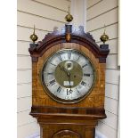 A 19th century flamed mahogany cased 8 day longcase clock, with silver chapter ring and subsidiary