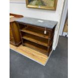 An early Victorian later marble topped mahogany bookcase, length 103cm, depth 41cm, height 92cm