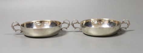 A pair of modern silver two-handled shallow nut dishes, with engraved inscription to the base, Royal