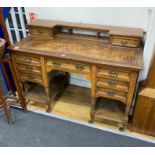 A late Victorian oak kneehole desk, length 122cm, depth 60cm, height 90cm