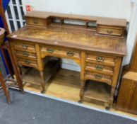 A late Victorian oak kneehole desk, length 122cm, depth 60cm, height 90cm