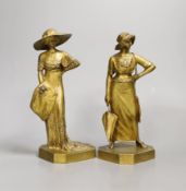 Henri Varenne (1860-1933). A pair of bronze figures 'La Parisienne 1911 and 1912', 18cm tall