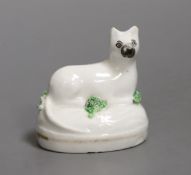 A rare Staffordshire porcelain figure of a recumbent cat, c.1830-50, 4.7cmNot recorded in Dennis G.