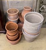 Approximately 26 assorted terracotta pots, largest height 24cm