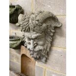 A reconstituted stone garden wall mask, height 40cm