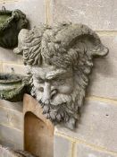 A reconstituted stone garden wall mask, height 40cm