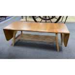 An Ercol elm drop flap coffee table, length 106cm, depth 45cm, height 36cm