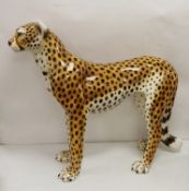 A large novelty ceramic leopard, 69cm tall