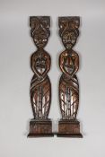 A pair of 17th century carved oak fragments, 39cm