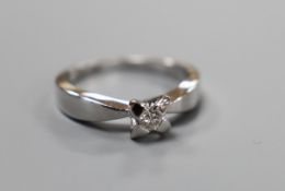 A modern platinum and single stone diamond set ring, size N, gross weight 6 grams, the diamond