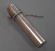 A Victorian silver cylindrical cased portable travelling candle holder with cover and spring