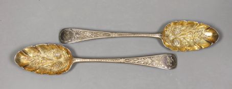 A pair of George III silver Old English pattern 'berry' spoons, Godbehere, Wigan & Bolt, London,